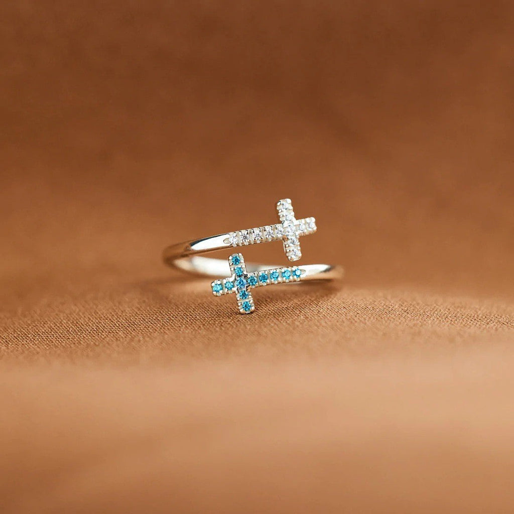Double layered cross blue and white diamond open ring
